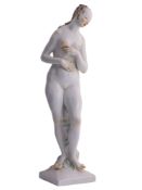 A PAINTED PORCELAIN FIGURE OF A NUDE LADY