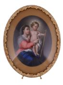 A CONTINENTAL PORCELAIN PLAQUE DEPICTING THE MADONNA AND CHILD, MID 19TH CENTURY