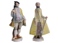 A PAIR OF GERMAN PORCELAIN FIGURES REPRESENTING AN 18TH-CENTURY HUNTER AND COMPANION, SCHWARZBURGER