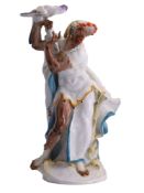 A MEISSEN PORCELAIN FIGURE "A BLACKAMOOR DANCER WITH A PARROT", MODELED BY PAUL SCHEURICH, GERMANY, 