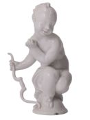A MEISSEN WHITE PORCELAIN FIGURE OF A PUTTO OR AMOR BY PAUL SCHEURICH, GERMANY, CIRCA 1910-1924