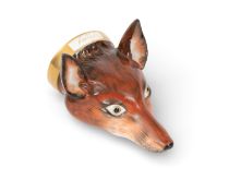 A Staffordshire porcelain stirrup cup, 1st half 19th century, formed as the head of a fox with ears 
