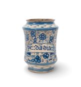 A Faenza maiolica albarello, c.1530, painted in blue in the famiglia gotica manner with a ribbon car
