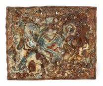 A rare slip-glazed pottery plaque of the Royal Coat of Arms, c.1780, moulded in high relief with the