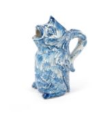 A rare Continental faïence figural jug, late 18th/19th century, modelled as an owl or mythical bird,