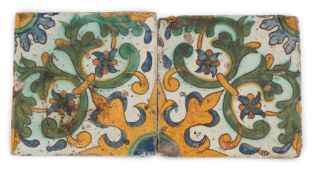 A pair of large Continental faïence floor tiles, probably late 18th/19th century Spain, painted in a
