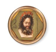 A Paris porcelain circular plaque of Neptune, 1st half 19th century, finely painted with the head of