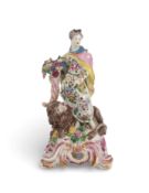 A Bow figure of Ceres, c.1760-65, emblematic of Earth from the Four Elements, standing before a recu