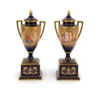 A pair of Vienna-style vases and covers, 19th century, well painted with scenes of Classical figures