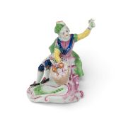 A Vauxhall figure of a boy, c.1756-60, possibly emblematic of Spring, seated on a scrolled rocky bas