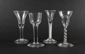 Four wine glasses, c.1745-60, one with a pan-topped bowl raised on a cable airtwist stem, one with a