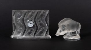 A Lalique 'Hulotte' clock, the curved rectangular form moulded with six owls and set with a circular