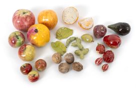 A selection of pottery trompe l'oeil models of fruit and nuts, 19th century and later, variously mod