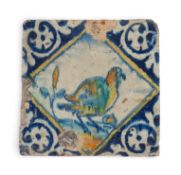 An English delftware paving tile, c.1640, Pickleherring or Rotherhithe, painted in polychrome enamel