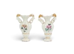 A pair of miniature Italian porcelain vases, c.1750-70, probably Capodimonte or Buen Retiro, after a