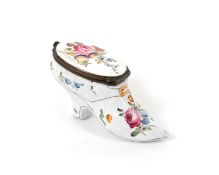 A Birmingham or South Staffordshire enamel snuff box or bonbonniere, c.1760-70, modelled as a lady's