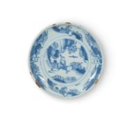 A rare and early London delftware saucer dish, late 17th century, of small size, painted in the Chin