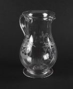 A Masonic glass jug, late 18th century, the baluster body engraved with Masonic symbols in cartouche