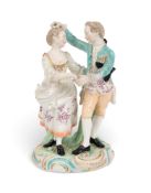 A Derby figure group of a dancing couple, late 18th century, after Meissen, a young gallant catching