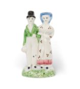 A small Portobello figure group of The Dandies, 1st half 19th century, also known as Dandy and Dandi
