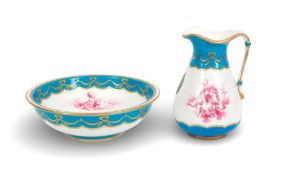 A Minton jug and basin, date code for 1874, painted in puce monochrome with scenes of putti in the m