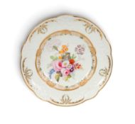 A Swansea cabinet plate, c.1815-17, the well painted with a bold arrangement of flowers including au