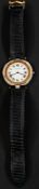 Watches: a Cartier Santos quartz wristwatch, in bimetallic case with sapphire cabochon to the winder