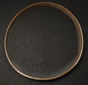 Jewellery: a 9ct yellow gold fixed bangle, London 1988, with facet cut edges and bark effect decorat