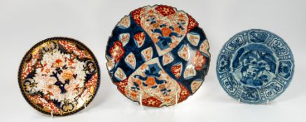 Asian Arts: an 18th century Chinese Arita blue and white 'deer in landscape' plate, the foliated bor