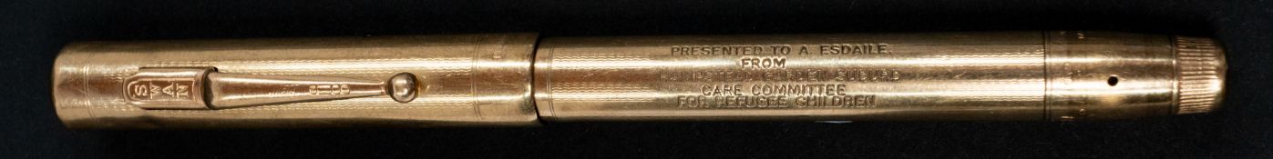 Desktop Requisites: a 9ct gold Mabie Todd Swan fountain pen, London 1937, with 14ct gold nib. 13.5cm