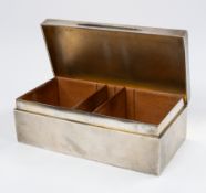 Silver: an oversized cigarette or cigar box by the Goldsmiths and Silversmiths Company, London 1912,