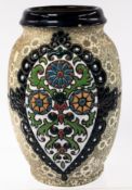 Ceramics: an early 20th century baluster vase by Amphora, with a single oval panel of tube lined sty