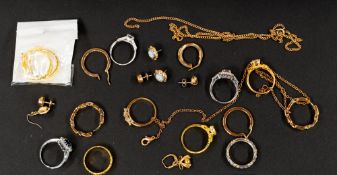 Jewellery: a 9ct yellow gold chain, 59.5cm, broken; a single earring; a silver eternity ring, and a 