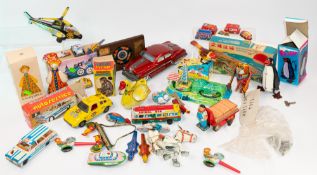 Toys: a Victorian mechanical kaleidoscope lantern slide; a tinplate clockwork penguin, boxed; a boxe