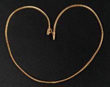 Jewellery: a yellow metal snake effect necklace, marked 750 and testing as 18ct gold, 46cm long, 19.
