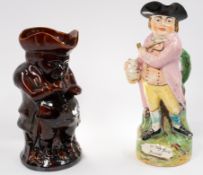 Ceramics - A Hearty Good Fellow Toby jug, 19th century, standing and holding his pipe and a foaming 