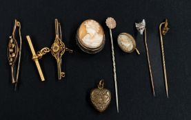 Jewellery: two yellow metal bar brooches, one marked '9ct', the other not marked but testing as gold