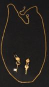 Jewellery: an 18ct yellow gold herringbone necklace, 53cm, 5.4g, together with two key charms, combi