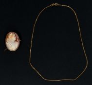 Jewellery: a 9ct yellow gold mounted cameo brooch, 3.5cm, 3.6g gross, together with a 40cm 9ct gold 