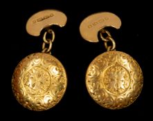 Jewellery: a pair of 18ct yellow gold cufflinks, Birmingham 1880, engraved with a regular floral des
