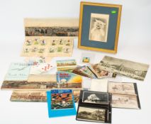 Ephemera: a framed Louis Wain bookplate of a cat, New Zealand and South Africa postcards, other post