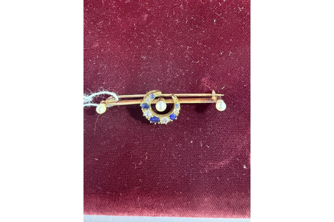 Jewellery: a yellow metal bar brooch, unmarked but testing as 18ct gold, a central crescent set alte - Image 1 of 2
