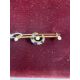 Jewellery: a yellow metal bar brooch, unmarked but testing as 18ct gold, a central crescent set alte - Image 1 of 2