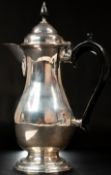 The Denis Lacy Hulbert Collection: Silver; an early 18th century style Britannia silver coffee pot, 