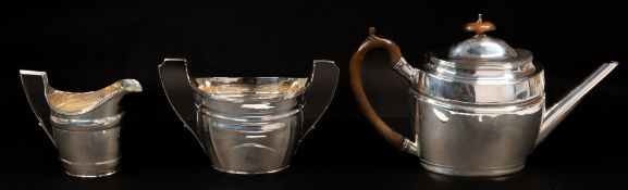 The Denis Lacy Hulbert Collection: Silver; a George III three piece tea set, the teapot and jug hall