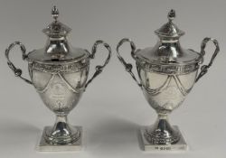 Silver: a neoclassical lidded urn, partially obscured maker's mark, London 1775, with twisted bifurc