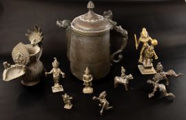 Metalware: a mid 19th century highly engraved Indo Persian coffee pot, with cooing birds thumbpiece 