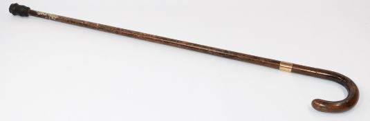 Decorative Arts: a 9ct gold mounted bamboo walking stick, hallmarked for London 1927 with the goldsm