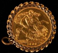 Coins: a 1965 Queen Elizabeth 22ct gold full sovereign in 9ct gold mount, combined weight 9.4g.