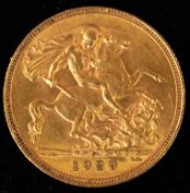 Coins: a 1929 George V full gold sovereign, circulated.